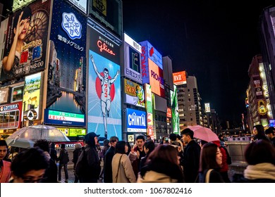 Osaka, Japan - 28 Feb 2018: The Gulico Man Digital Signage Billboard Is The Popular Landmark / Tourist Attraction In The Night At Namba District, Osaka, Japan.