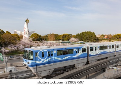 Osaka, Japan - April 1 2021: Osaka Monorail Showing Appreciation For Health Care Workers, Passing Expo '70 Commemorative Park