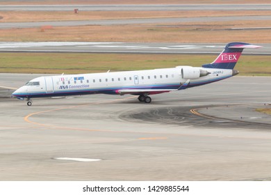 Osaka, Japan. December 7, 2018. Ibex Airlines Bombardier CRJ-700 Reg.JA06RJ Taxi To Gate Terminal After Land At Osaka Itami International Airport