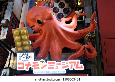 Osaka, Japan - January 5, 2018: Famous Takoyaki Stores Is The Dotonbori Konamon Museum, Which Is Easily Recognized By The Giant Red Octopus On Its Shop Front.

