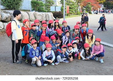 OSAKA, JAPAN - NOVEMBER 22, 2016: School Trip Visits Osaka Castle Park In Japan. Osaka Belongs To 2nd Largest Metropolitan Area Of Japan (19.3 Million People).