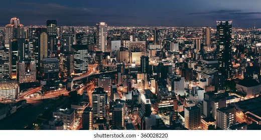 Osaka Urban City At Night Panorama Rooftop View. Japan.