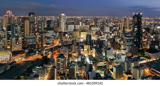 Osaka Urban City At Night Panorama Rooftop View. Japan.