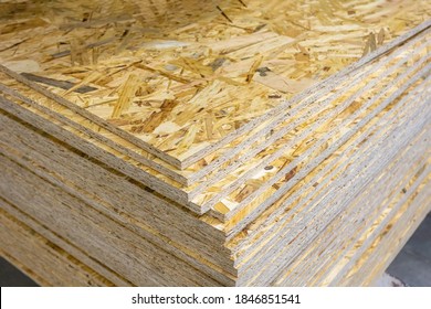 OSB - Oriented strand board. Stacked OSB sheets. Sheet material for the construction of frame houses - Shutterstock ID 1846851541