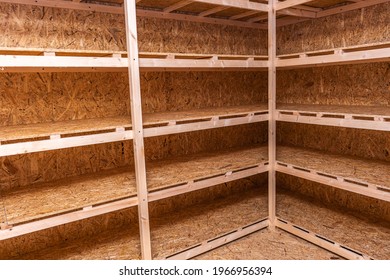 OSB Racks, Shelves Are Designed For Storing Things. Dressing Room In The House. Organization Of Spaces In The House. Shelves In The Garage.