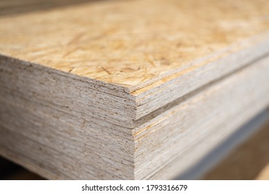 OSB sheets stacked in a hardware store. Construction material WOOD - Shutterstock ID 1793316679