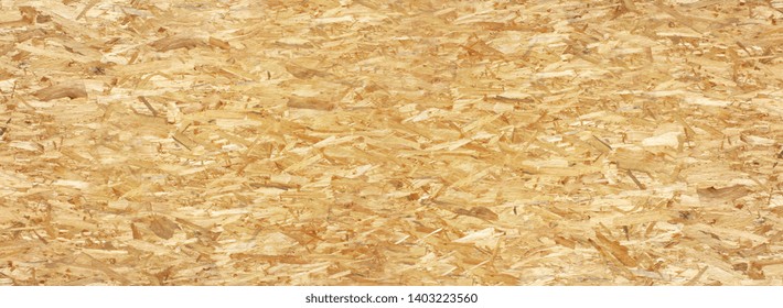 OSB wood (Oriented strand board) background - Shutterstock ID 1403223560