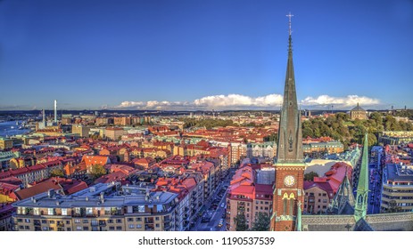 Oscar Fredriks Church tower in the foreground and Gothenburg cityscape in the background. 