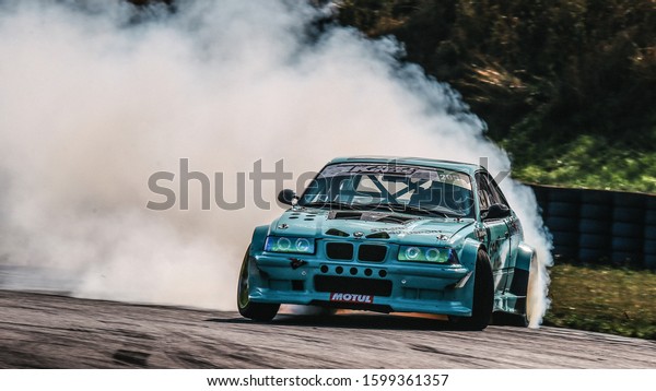 Oschersleben, Germany, August 31,\
2019: Alexandre Strano driving a BMW E36 M3 Turbo by Strano\
Autosport during the Drift Kings International Series in\
Germany.