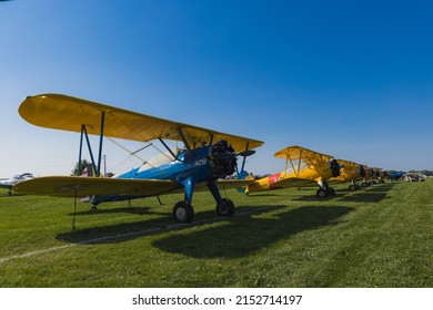 OSHKOSH, UNITED STATES - Jul 25, 2021: A Row of World War Warbird biplanes at Airventure
