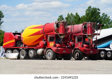 Oshkosh, Wisconsin USA - July 30th, 2022: Red And Yellow Cement Mixer.