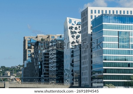 Oslo Barcode Project architecture creating an urban cityscape on a sunny day