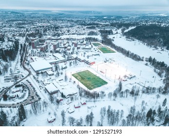 Oslo City Aerial View From Drone, Snow Covered Soccerfield 