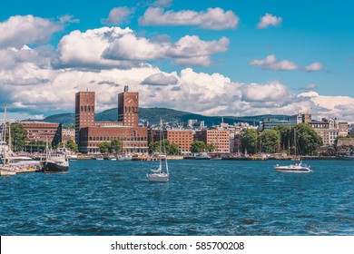 Oslo City Hall and Oslo cityscape from the sea during warm summer day