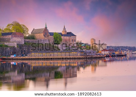  Oslo downtown city skyline cityscape in Norway at sunset