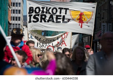 OSLO - MAY 1: Activists Carry A Banner In Norwegian: 