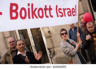 OSLO - MAY 1: Activists Carry A Banner In Norwegian: 