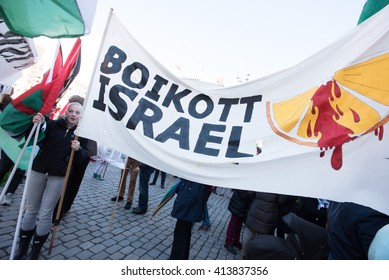 OSLO - MAY 1: Solidarity Activists Carry  Banners Calling For A Boycott Of Israel During The May Day Parade In Oslo, Norway, May 1, 2016.