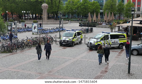 Oslo, Norway -05-11-2019: Police cars\
in front of Police office at Oslo Central Station.\
