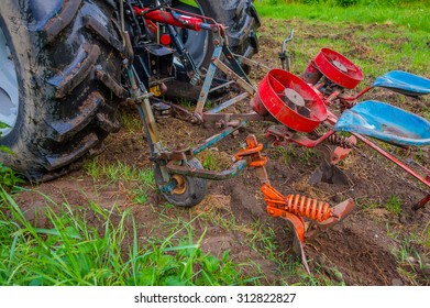 OSLO, NORWAY - 8 JULY, 2015: Two Seated Potato Machine Used For Planting Hooked To Tractor.