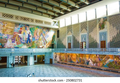 OSLO, NORWAY - APRIL 12, 2010: Main Hall In The City Hall Of Oslo. Murals Featuring The Norwegian People In Action 