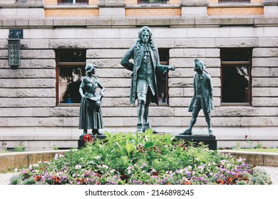 Oslo, Norway - August 2, 2019:  Statue of writer Ludvig Holberg near the National Theatre on Karl Johans gate street