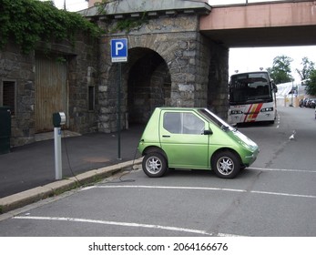 Oslo, Norway - July 26 2009: A Norwegian Electric Car Parked And Being Charged In A Street Of Oslo City