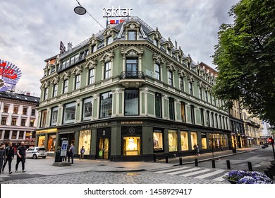 OSLO, NORWAY - JUNE 14, 2017: Street scene in Oslo city center at sunset. Oslo, capital city of Norway.