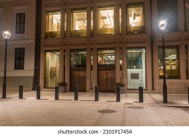 Oslo, Norway - September 24, 2021: Entrance to Norges Bank at night. The old central bank of Norway.