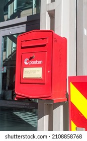 Oslo, Norway - September 25, 2021: Red post box of Posten Norge (The Norwegian Post).