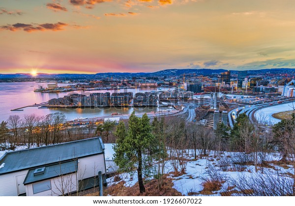 Oslo Norway, sunset city skyline at business\
district and Barcode\
Project