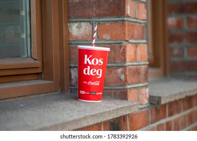 Oslo.Oslo/ Norway- 07.25.2020: Big Red Coca Cola Cup And A Straw. Left By Someone On The Street Soda Cup.
