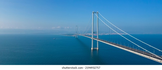 Osmangazi Bridge (Izmit Bay Bridge). IZMIT, KOCAELI, TURKEY. Aerial shot with drone. - Powered by Shutterstock