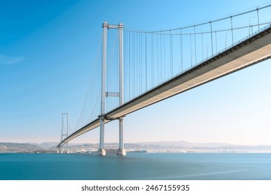 Osmangazi Bridge (Izmit Bay Bridge) located in Izmit, Kocaeli, Turkey. Suspension bridge captured with long exposure technique. Osmangazi Köprüsü - Powered by Shutterstock