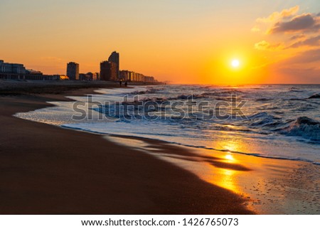 Ostend (Oostende) city beach at sunset by the North Sea, Belgium.