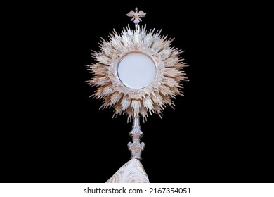 Ostensory for worship at a Catholic church ceremony - Adoration to the Blessed Sacrament, Catholic Church, Eucharistic Holy Hour, Holy Week - Shutterstock ID 2167354051