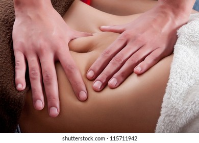 osteopathy procedure on the belly