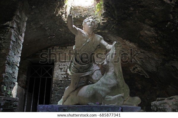 OSTIA ANTCA, ITALY -  JULY  2, 2017: Mithra God Statue at the underground Mithraeum temple in Osta Antica the ancient Roman town 