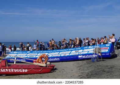 Ostia, Rome, Italy - August 21, 2022, Spectators On The Beach Watch The 10 Kilometer Open Water Race During The European Swimming Championships.