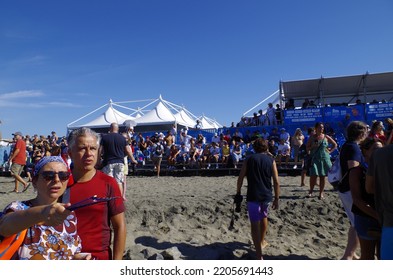 Ostia, Rome, Italy - August 21, 2022, Spectators On The Beach Watch The 10 Kilometer Open Water Race During The European Swimming Championships.