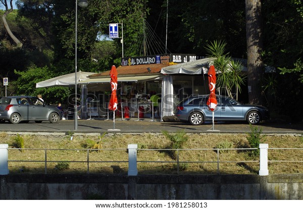Ostia, Rome, Italy - May 25,\
2021, Al Dollar kiosk, at the entrance to the public park of the\
Pineta.