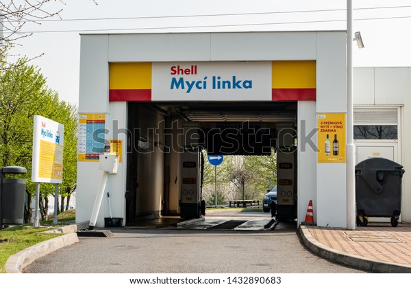 OSTRAVA,\
CZECH REPUBLIC - APRIL 9, 2019: Empty car wash (Myci linka in Czech\
language) of the Shell company with no car in\
it