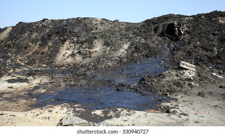 OSTRAVA, CZECH REPUBLIC - AUGUST 3, 2015: The Former Dump Toxic Waste In Ostrava, Oil Lagoon, Ostramo, Effects Nature From Soil Contaminated With Chemicals And Oil, Moravia-Silesia Region, Europe, EU