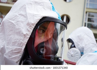 Ostrava, Czech Republic - October 8 2020: Firefighters With Protective Suits And Masks Against Coronavirus During Disinfection And Decontamination Of Retirement Home Due To The Occurrence Of Covid 19