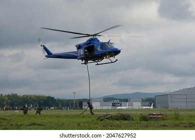 Ostrava, Czech Republic - September 26 2021: Special Tactical SWAT Police Intervention Team Abseils From A Helicopter To Demonstrate Their Capabilities
