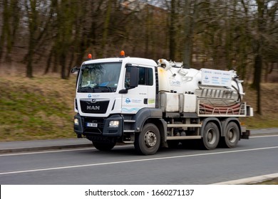 OSTRAVA, CZECHIA - FEBRUARY 2019: The White MAN T65 Truck With Water Pump As An Emergency Vehicle Of Ostravske Vodarny A Kanalizace Company With Slight Panning Effect And Motion Blur.