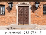 Ostrogski Palace. Entrance to Ostrogski Castle. Door. Details and elements of architecture. Sights.