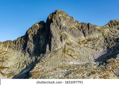 Ostry Szczyt (Ostry stit) - peak seen from the side of the Starolesna Valley (Velka Studena dolina). It is a frequent target for mountain climbers. - Shutterstock ID 1831097791