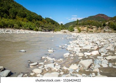 Osumi River In Skrapar Albania. This Is The River On The Month Of September When Its Flow Its At The Lowest Rate And The Clarity Of The Water Is Very Bad