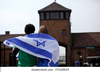 OSWIECIM, POLAND - APRIL 16, 2015: Holocaust Remembrance Day Next Generation Of People From The All The World Meets On The March Of The Living In  German Death Camp In Auschwitz Birkenau, In  Poland